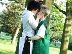  amano_ginji black_hair blonde_hair cosplay couple getbackers hug kissing midou_ban pants short_hair sunglasses tree yaoi 