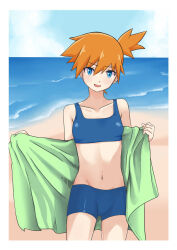  bikini blendinglight blue_bikini blue_eyes border breasts cloud collarbone cowboy_shot day female hair_between_eyes highres holding holding_towel kasumi_(pokemon) looking_at_viewer mixed-language_commentary navel one_side_up open_mouth orange_hair outdoors pokemon pokemon_frlg sand shore sky smile solo swimsuit towel water white_border 
