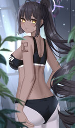  ahoge alternate_costume ass back backlighting bad_id bad_pixiv_id bare_arms bare_shoulders black_buruma black_hair black_sports_bra blue_archive blush breasts buruma commentary_request cowboy_shot dark-skinned_female dark_skin earrings female from_behind gaitoou halo highres jewelry karin_(blue_archive) large_breasts long_hair looking_at_viewer looking_back number_tattoo pantyhose parted_lips ponytail shoulder_tattoo sideboob solo sports_bra stud_earrings tattoo very_long_hair white_pantyhose yellow_eyes 