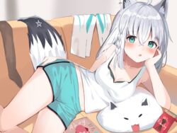  ahoge alternate_costume animal_ear_fluff animal_ears blue_shorts blush braid brand_name_imitation breasts cleavage collarbone commentary_request couch dolphin_shorts ear_piercing female food fox_ears fox_girl fox_tail fubuzilla_(shirakami_fubuki) green_eyes hair_between_eyes hololive houshou_marine long_hair lying medium_breasts mizuki_ryuu on_couch on_side parted_lips piercing pocky shirakami_fubuki short_shorts shorts side_braid solo tail tank_top virtual_youtuber white_hair white_tank_top 