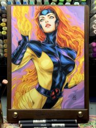  2025 art_tools_in_frame blue_eyes bodysuit breasts commentary english_commentary female fiery_hair fire highres jean_grey large_breasts long_hair looking_up marker_(medium) marvel multicolored_bodysuit orange_hair parted_lips photo_(medium) pyrokinesis red_lips signature skin_tight solo stanley_lau traditional_media two-tone_bodysuit x-men 