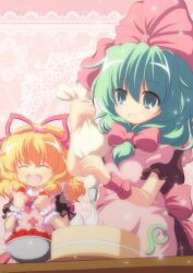  2girls apron blonde_hair cake closed_eyes commentary_request eating food front_ponytail fruit green_eyes green_hair hair_ribbon highres kagiyama_hina medicine_melancholy multiple_girls nullpooo open_mouth ribbon strawberry touhou whipped_cream wrist_cuffs 