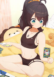  absurdres ahoge bed black_shorts black_sports_bra blush breasts brown_hair card cellphone collarbone commentary_request dog_tags ebi_frion_(natsuiro_matsuri) female green_eyes hair_between_eyes highres holding holding_card holding_phone hololive indian_style indoors long_hair lunch_boxer matsurisu natsuiro_matsuri navel on_bed phone pokemon pokemon_card pokemon_tcg short_shorts shorts sitting small_breasts smartphone solo sports_bra underwear virtual_youtuber 