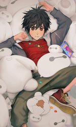  1boy 9ibem arm_up baymax big_hero_6 black_hair brown_eyes candy closed_mouth disney_tsum-tsum fingernails food food_in_mouth grey_hoodie hair_between_eyes heart highres hiro_hamada hood hood_down hoodie lollipop looking_at_viewer lying male_focus on_back open_clothes open_hoodie red_footwear solo spread_legs stuffed_toy 