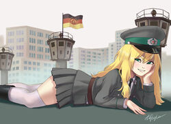  aqua_eyes belt berlin_wall black_footwear black_necktie blonde_hair boots brown_belt building commentary east_german east_german_flag feet_out_of_frame female flag from_side giant giantess grenztruppen grey_jacket grey_skirt grey_sky hat highres jacket long_hair looking_at_viewer lying military military_uniform miniskirt mole mole_under_eye necktie oerba_yun_fang on_stomach original outdoors peaked_cap pleated_skirt russian_commentary shirt signature skirt sky smile solo teaparty teeth thighhighs tower uniform white_shirt white_thighhighs 