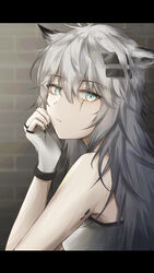  animal_ears arknights bare_arms bare_shoulders black_nails commentary female fingerless_gloves gloves grey_eyes grey_hair hair_between_eyes hair_ornament hairclip hand_up highres indoors kiyakyuu lappland_(arknights) letterboxed long_hair looking_at_viewer material_growth nail_polish oripathy_lesion_(arknights) scar scar_across_eye scar_on_face solo strapless tube_top upper_body white_gloves wolf_ears 