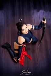  female high_heels katana kneeling long_boots marvel photo psylocke short_hair sword weapon x-men yaya_han 