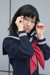  awatsuki_anzu bangs black-framed_glasses black_hair black_shirt cosplay female glasses hands_up head_tilt ichigo_100 ichigo_100_percent light_smile lips long_sleeves looking_at_viewer photo school_uniform serafuku shirt short_hair smile solo toujou_aya upper_body 