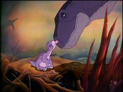  4:3 ambiguous_gender apatosaurus baby dinosaur diplodocid don_bluth duo extinct extreme_size_difference face_lick feral licking littlefoot low_res mother_(lore) official_art parent_(lore) prehistoric_species reptile sauropod sauropodomorph scalie screencap size_difference tail the_land_before_time tongue tongue_out unknown_artist young young_feral 