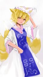  animal_ears blonde_hair commentary_request female fox_ears fox_tail hat hko multiple_tails short_hair solo tail touhou wide_sleeves yakumo_ran yellow_eyes 