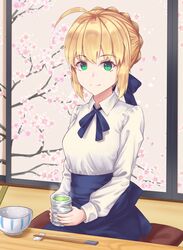  ahoge artoria_pendragon_(fate) blonde_hair blue_ribbon blue_skirt braid chopstick_rest chopsticks collared_shirt commentary_request cup fate/stay_night fate_(series) female green_eyes green_tea hair_ribbon highres holding holding_cup indoors looking_at_viewer neck_ribbon nihnfinite8 ribbon saber_(fate) shirt short_hair sitting skirt smile solo tea white_shirt wing_collar yunomi 