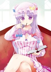  blush book bow breasts cleavage commentary_request couch crescent crossed_legs female food hairbow hat large_breasts long_hair looking_at_viewer patchouli_knowledge pocky porurin purple_eyes purple_hair sitting solo touhou 