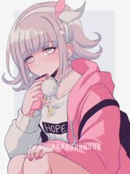  alternate_costume choker criis-chan danganronpa female flipped_hair hair_ornament hairclip looking_at_viewer nanami_chiaki phone pink_eyes pink_hair pink_nails pink_sweater simple_background solo solo_focus super_danganronpa_2 sweater twitter_username two-tone_background 