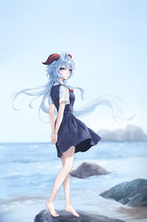  absurdres ahoge alternate_costume arms_behind_back bare_legs barefoot black_dress blue_hair blue_sky breasts closed_mouth commentary contemporary day dress female from_side full_body ganyu_(genshin_impact) genshin_impact highres horizon horns long_hair looking_at_viewer looking_to_the_side medium_breasts ocean outdoors own_hands_together pinafore_dress purple_eyes raku_(clearpage) rock shirt short_sleeves sky sleeveless sleeveless_dress smile solo standing very_long_hair water white_shirt 