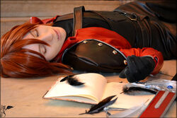  book closed_eyes cosplay crisis_core_final_fantasy_vii feathers final_fantasy final_fantasy_vii genesis_rhapsodos jacket male_focus photo red_hair red_jacket solo sword 