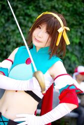  armband cape cosplay hair_ribbon hair_ribbons halter_top halterneck highres midriff ousawa_karin photo ribbon suzumiya_haruhi suzumiya_haruhi_no_tomadoi suzumiya_haruhi_no_yuuutsu sword weapon 