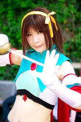  armband cape cosplay hair_ribbon hair_ribbons halter_top halterneck highres midriff ousawa_karin photo ribbon suzumiya_haruhi suzumiya_haruhi_no_tomadoi suzumiya_haruhi_no_yuuutsu sword weapon 