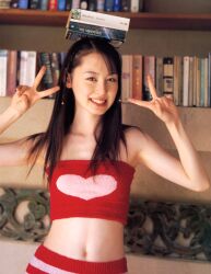  akiyama_rina black_hair book_balance female flat_chest long_hair midriff photo solo tubetop 