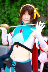  armband cape cosplay hair_ribbon hair_ribbons halter_top halterneck highres midriff ousawa_karin photo ribbon suzumiya_haruhi suzumiya_haruhi_no_tomadoi suzumiya_haruhi_no_yuuutsu sword weapon 