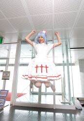  blue_hair cosplay highres jumping kouno_tooru kouzuki_suzuka nurse nurse_uniform photo princess_princess 