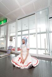  blue_hair cosplay highres kouno_tooru kouzuki_suzuka nurse nurse_uniform photo princess_princess 