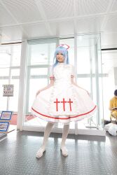  blue_hair cosplay highres kouno_tooru kouzuki_suzuka nurse nurse_uniform photo princess_princess 