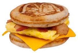  artemis-the-nard0 bacon bread cheese cheese_singles dairy_products english_muffin food low_res mcdonald&#039;s meat not_furry sandwich_(food) scrambled_eggs simple_background white_background zero_pictured 