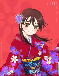  2011 ariga_nao blush brown_eyes brown_hair commentary_request female flower gertrud_barkhorn hair_down hair_flower hair_ornament japanese_clothes kimono long_hair new_year red_kimono smile solo strike_witches world_witches_series 