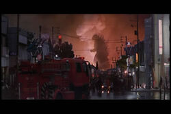  firetruck godzilla japan lowres power_lines smoke toho_(film_company) traffic_light 